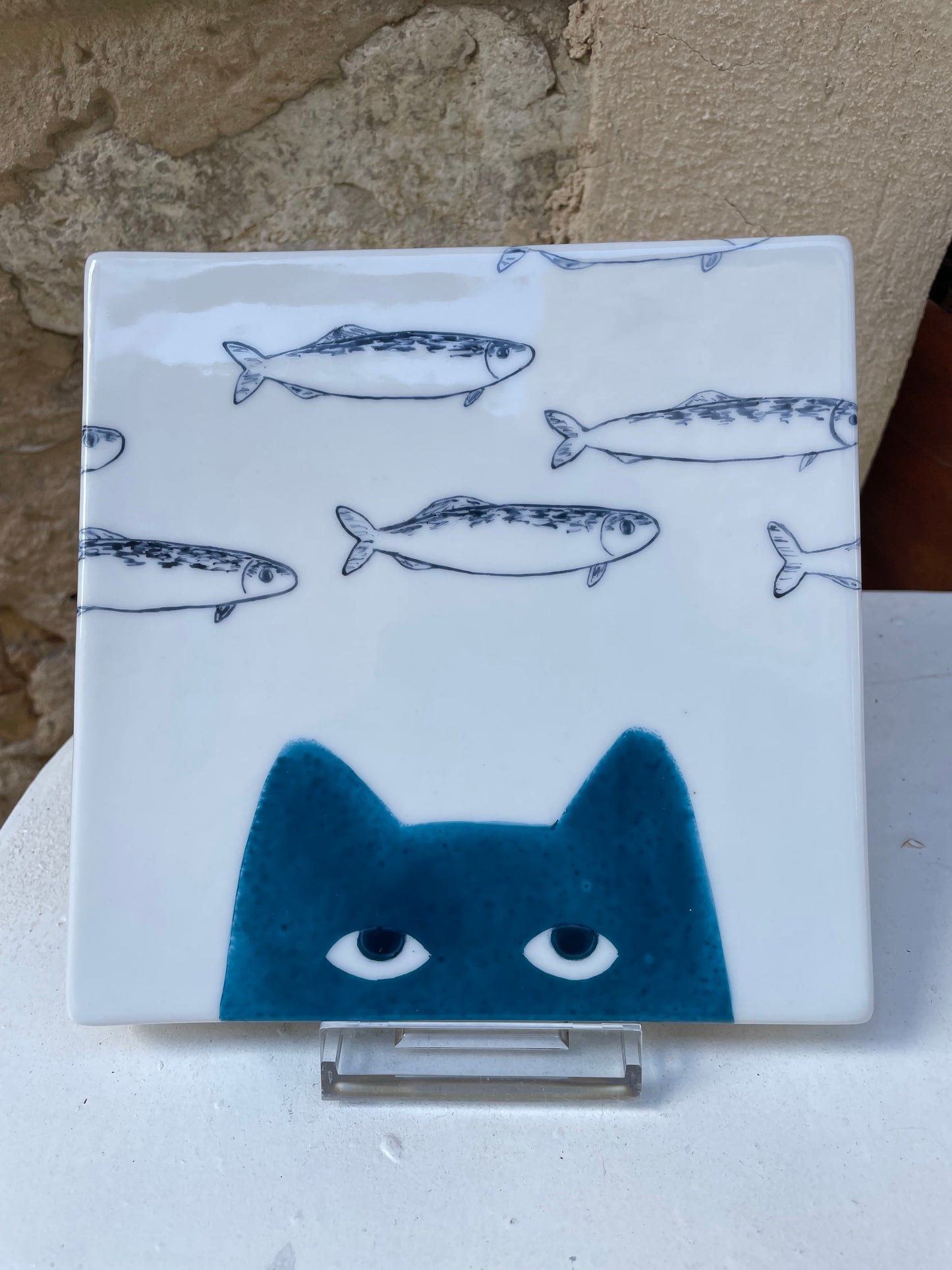 Dessous de plat chat et sardines