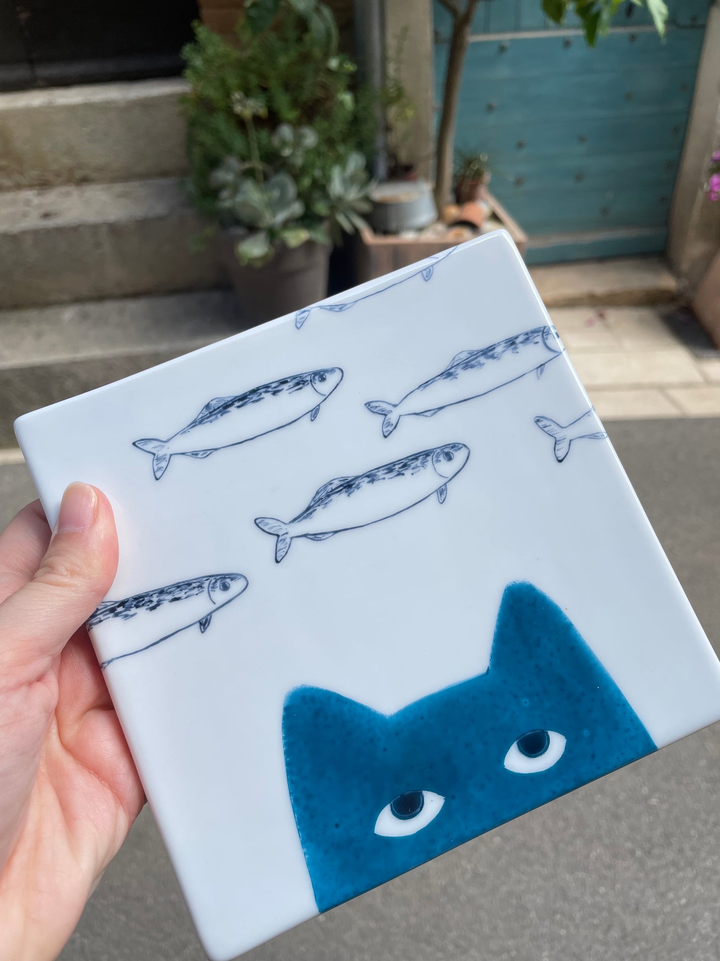Dessous de plat chat et sardines